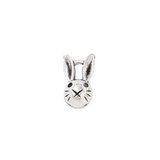 Silver bunny-shaped charm on a white background