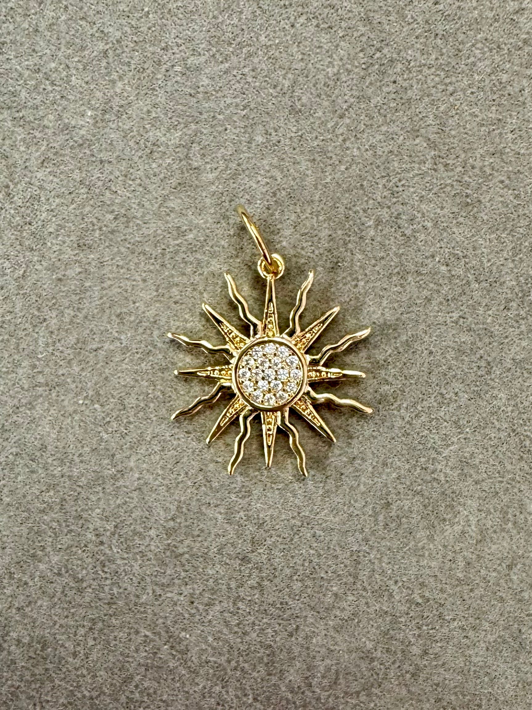 Wavy Sun Charm