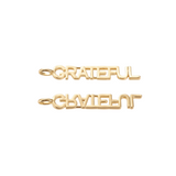 Front & back view of the Gold Grateful Bar Charm