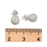 Front of the Silver Pineapple Charm with a ruler